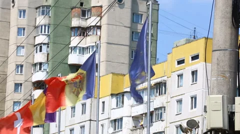 International flags of several countries waving in the wind on the balcony of a  Video stock 64881250