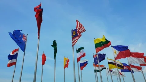 International multi flags pole sway in outdoor wind world collaboration Stock Footage 124039736