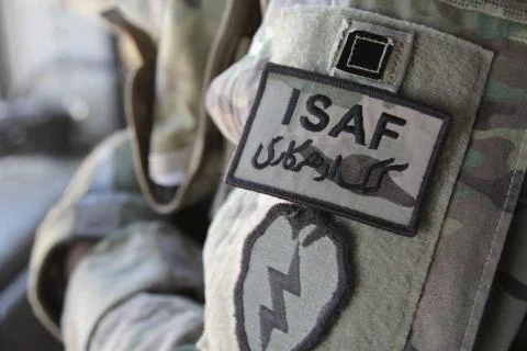 International Security Assistance Force patch on uniform arm (HD)c Fotos de archivo
