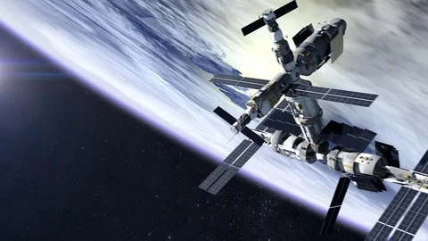 International space station appears in the frame and flies away from camera. ISS Stock Footage 73426902