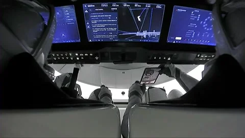 International Space Station crew using tablet to photograph docking Stock Footage 268429061