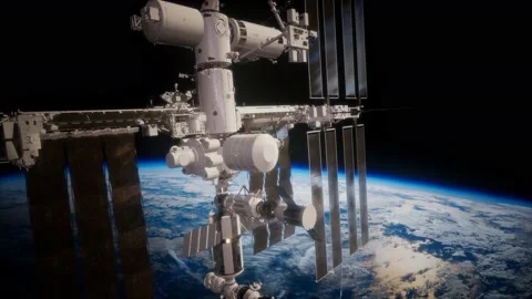 International Space Station in outer space over the planet Earth Stock Footage 150347699