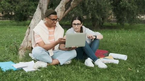 International students out door chacking their results and happily greet each Video stock 197510328