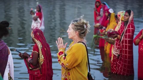 International Tourist Foreign Devotee Participating In Sacred Chhath Puja R.. Stock Footage 340890328
