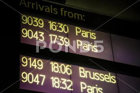 International train arrivals board Stock Photos