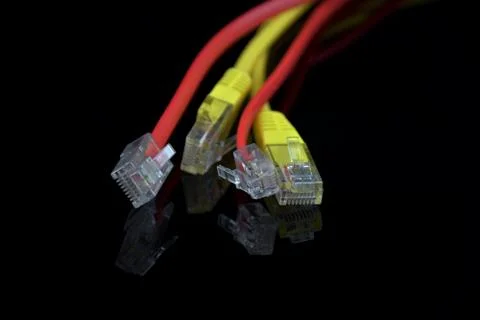 Internet Access. Wires for internet connection on a black background. Reflect Stock Photos