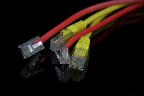 Internet Access. Wires for internet connection on a black background. Reflect Stock Photos