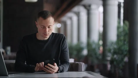 Internet Addicted Man With Modern Smartphone, Using New Mobile App, Portrait Of Stock Footage 247734621