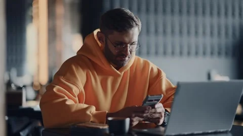 Internet Addiction And Gadgets Overuse, Modern Man With Smartphone And Laptop Stock Footage 343399365