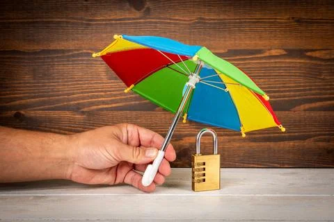 Internet and data security concept. Padlock on wooden table Stock Photos