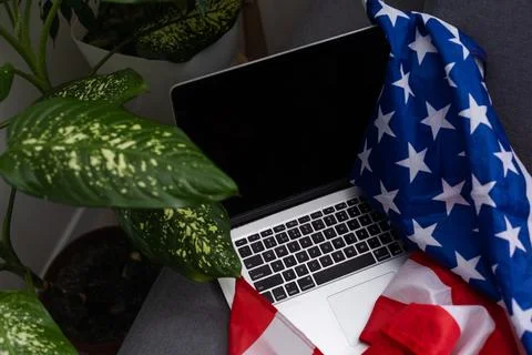 Internet and network security. Computer with binary computer code and American Stock Photos