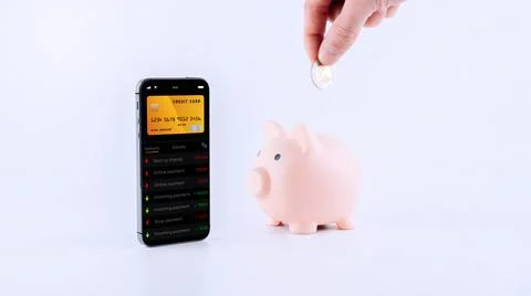Internet based banking. Mobile phone with internet online bank app. Piggy bank Stock Photos