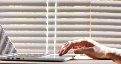 Internet browsing, closeup of hand using touchpad on laptop computer Stock Footage 107315145