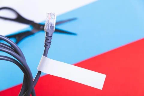 Internet cable and scissors cut it. Disconnection of Internet network. Connec Stock Photos