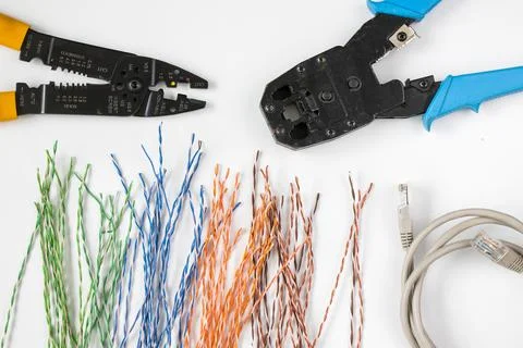 Internet cable and tools on the white background Stock Photos