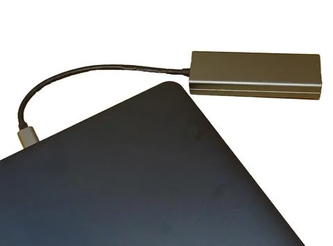 Internet cable connected to a multi-functional USB-C Hub station, Ethernet,.. Stock Photos