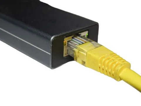Internet cable connected to a multi-functional USB-C Hub station, Ethernet Photos