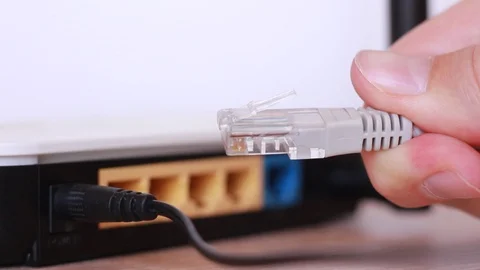 Internet cable in front of Wi Fi router 動画素材 88764306