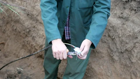 Internet cable in the ground Stock Footage 86091903