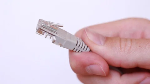 Internet cable in man's hand closeup Stock Footage 88764275
