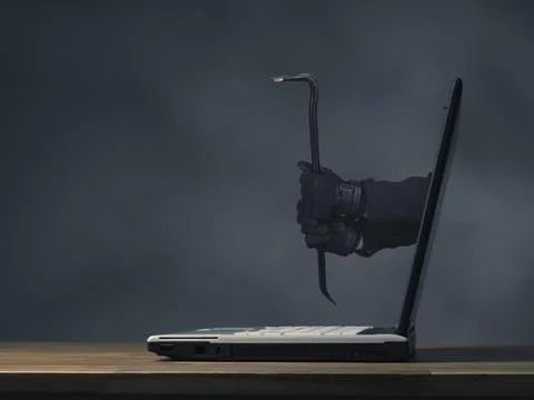 Internet concept image with hands holding a crowbar 写真素材