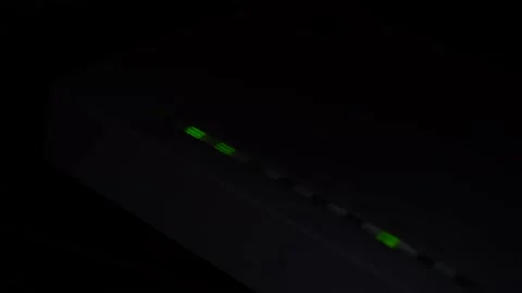 Internet connection unit, flashing green network load lights Wi Fi Stock Footage 148901837