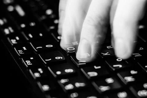 Internet crime concept. Hacker working on a code on dark digital background w Foto stock
