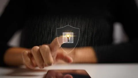 Internet data protection concept. User hand touching virtual screen shield .. Stock Photos
