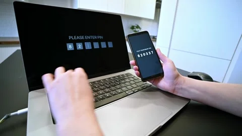 Internet data security. Woman entering his online banking password. Two fac.. Stock Footage 246548586