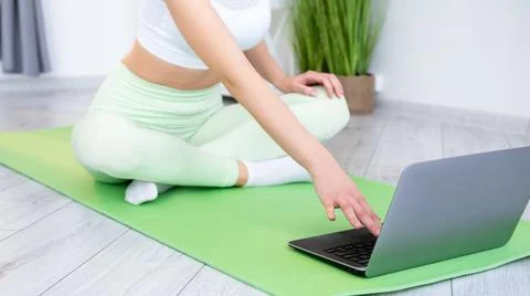 Internet fitness class gymnastics tutorial woman 写真素材