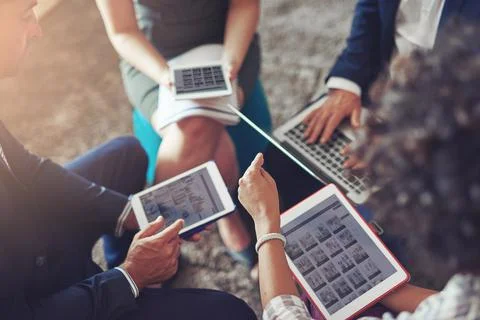 The internet has streamlined the way workers exchange information. High angle Stock Photos