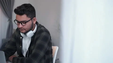 Internet leisure virtual study laptop man home Stock Footage 194555860