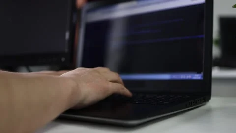 Internet programmers use keyboards to type and write code Stock Footage 168967339