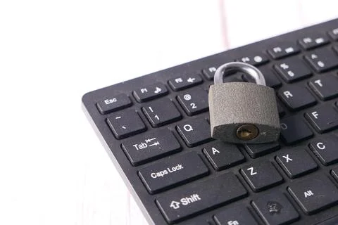 Internet safety concept with padlocked on computer keyboard Stock Photos