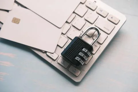 Internet safety concept with padlocked on computer keyboard Stock Photos