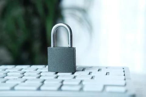 Internet safety concept with padlocked on computer keyboard Stock Photos
