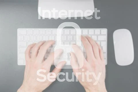 Internet security computer data symbol on blured keyboard background. Hacker  Stock Photos