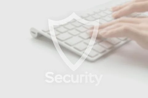 Internet security computer data symbol on blured keyboard background. Hacker  Stock Photos