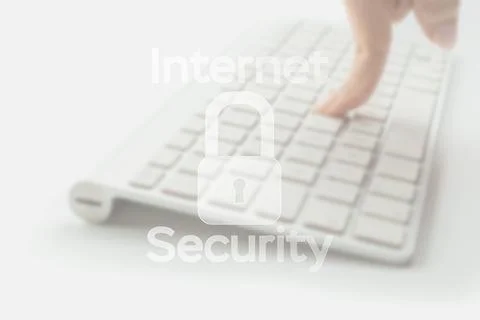 Internet security computer data symbol on blured keyboard background. Hacker  Stock Photos
