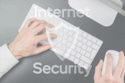 Internet security computer data symbol on blured keyboard background. Hacker  Stock Photos