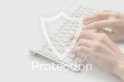 Internet security computer data symbol on blured keyboard background. Hacker  Stock-Fotos