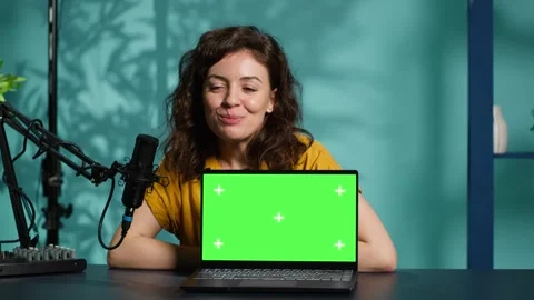 Internet show host filming electronics haul, presenting mockup laptop Stock Footage 318454953