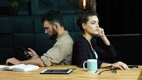 Internet surfing instead converation Stock Footage 92138352