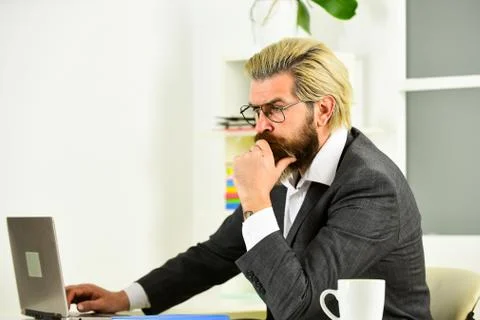 Internet surfing. Modern technology. Web developer. Desperation sometimes drives Stock Photos