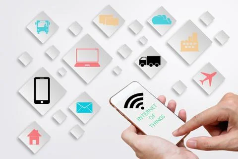 Internet of Things concept (IoT) with man hands holding smart phone in orde.. Stock Photos