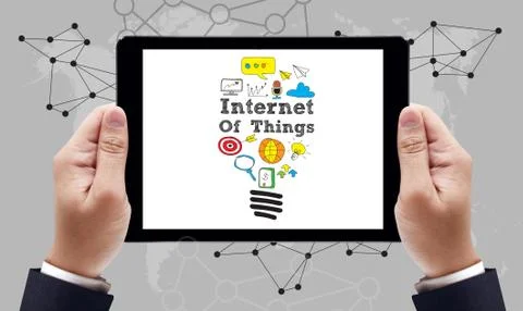 Internet of things (IOT) concept text on the tablet pc screen Stock Photos