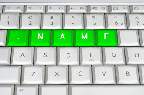 Internet top level domain .name spelled on metallic keyboard Illustration