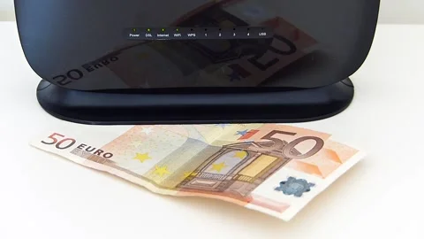 Internet usage fee increase during covid-19 period, modem and 50 euros stand  動画素材 162120282