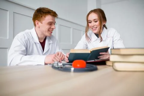 Interns have a rest in the internship during a short break and rejoice Stock Photos