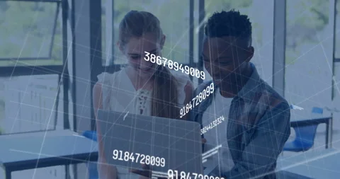 Interns sitting at office desk, analyzing cybersecurity data with network lines Stock Footage 309285676